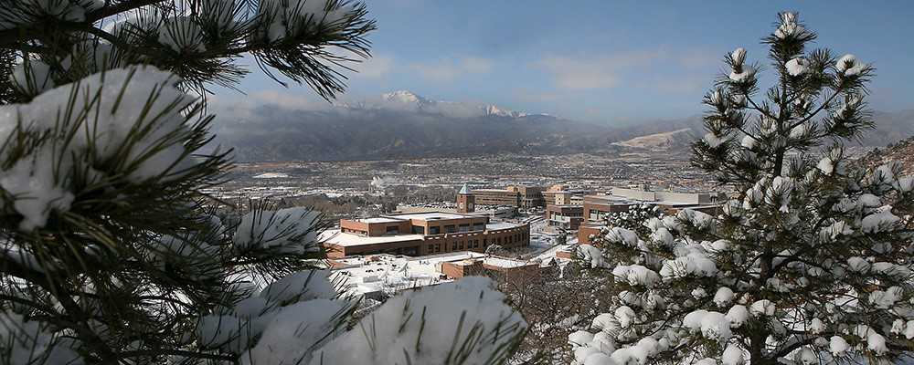 photograph of pikes peak behind campus
