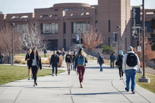 Students walking on UCCS spine.