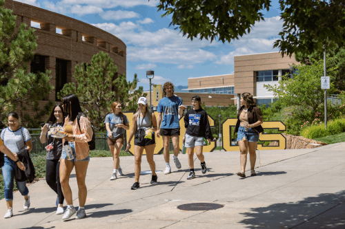 students walking on UCCS campus